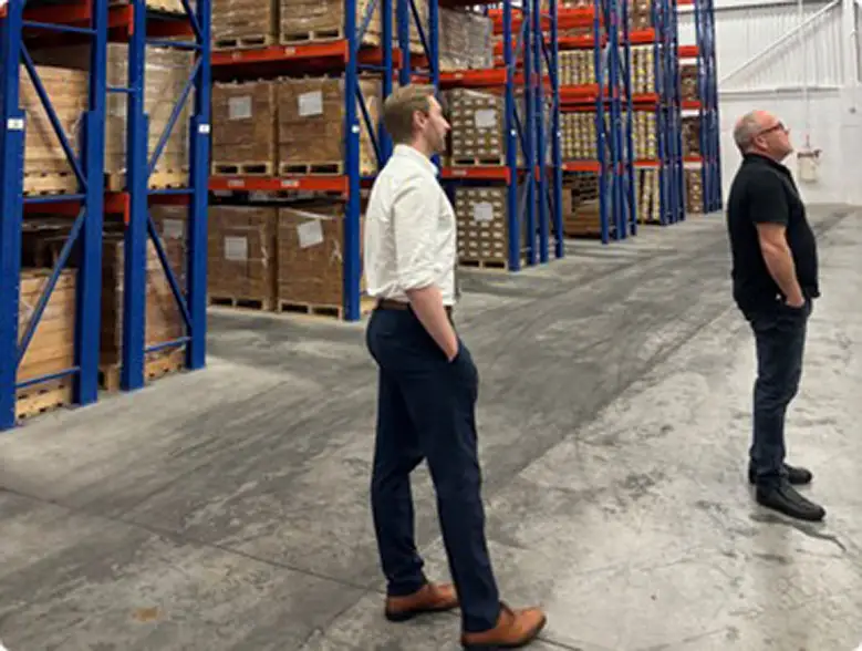 Schooner Energy representatives visiting Newfoundland’s offshore core storage facility containing well cuttings, core samples and geological data.