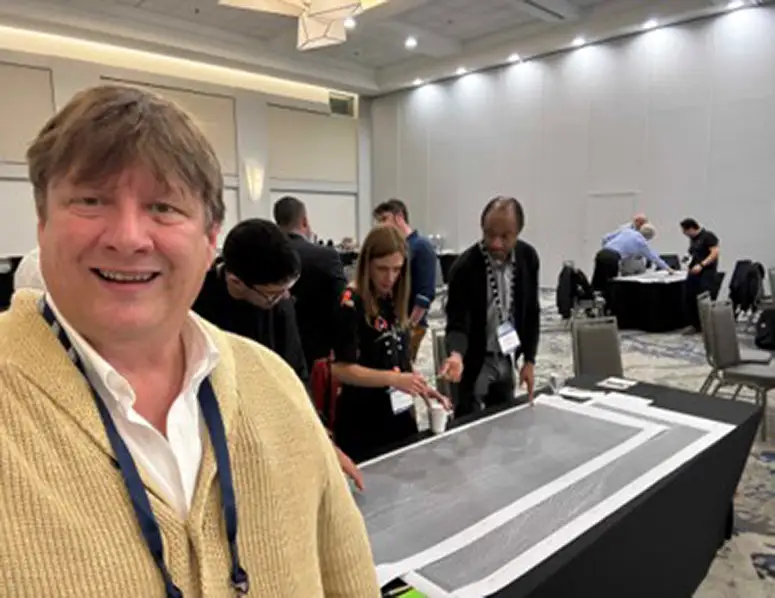 Rod Gibbons on behalf of Suncor at the Seismic Revelations Workshop, where geoscientists collaboratively interpreted 3D seismic data.